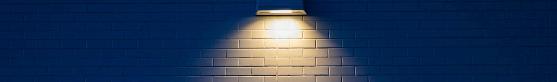 wall lamp turned on on wall